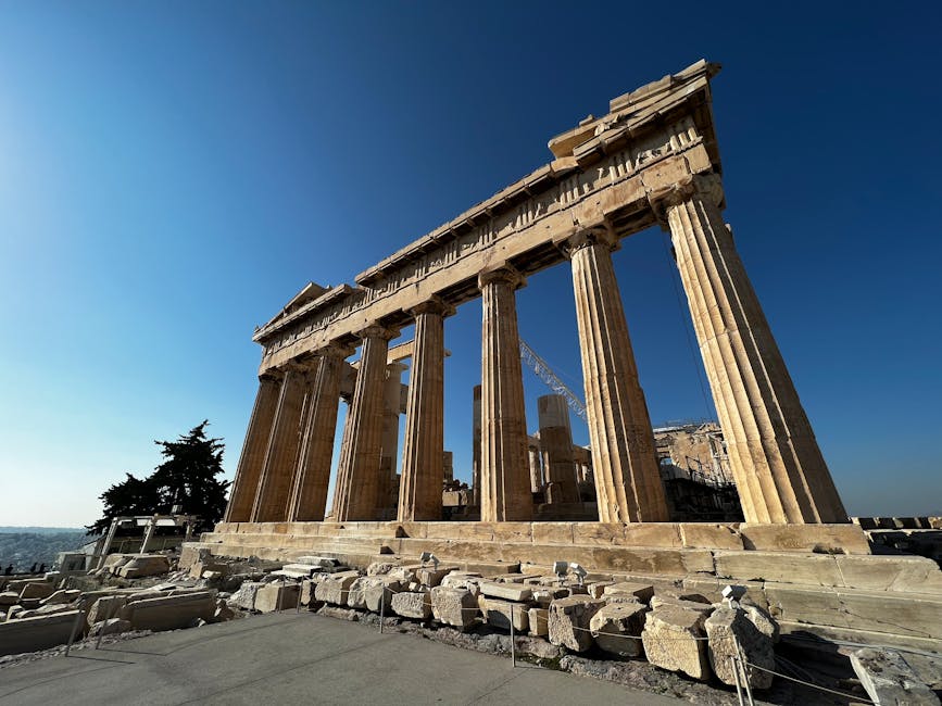 Explore the ancient grandeur of the Parthenon under a clear blue sky in Athens, Greece.